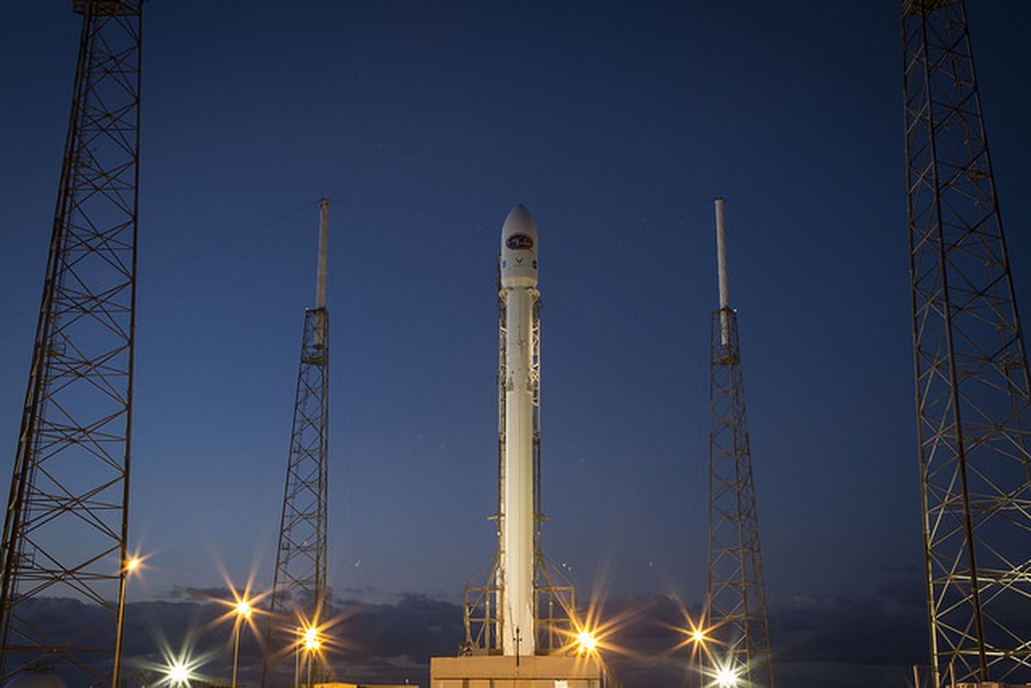 Rocket on a launch pad at dusk